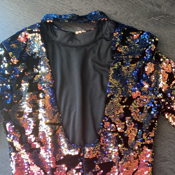 New with tags party dress. This dress is stunning and never been worn. - Picture 5 of 9